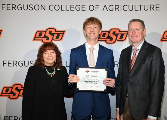 Pictured are Dr. Cynda Clary, associate dean, Ferguson College of Agriculture, Jake Schreiner, and Dr. Jayson Lusk, vice president and dean, OSU Agriculture. Courtesy photo
