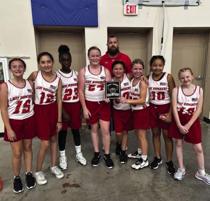 The Frederick Lady Bombers sixth grade girls’ basketball team took first place in the Southern 8 Conference Tournament at Geronimo recently, securing an impressive 18-13 victory. Courtesy photo