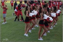 Bomber Cheerleaders doing what they do best – cheering their team on in 110 degree temperatures.